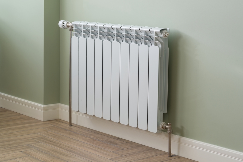 Heating Radiator, White radiator in an apartment Heating Radiator, White radiator in an apartment